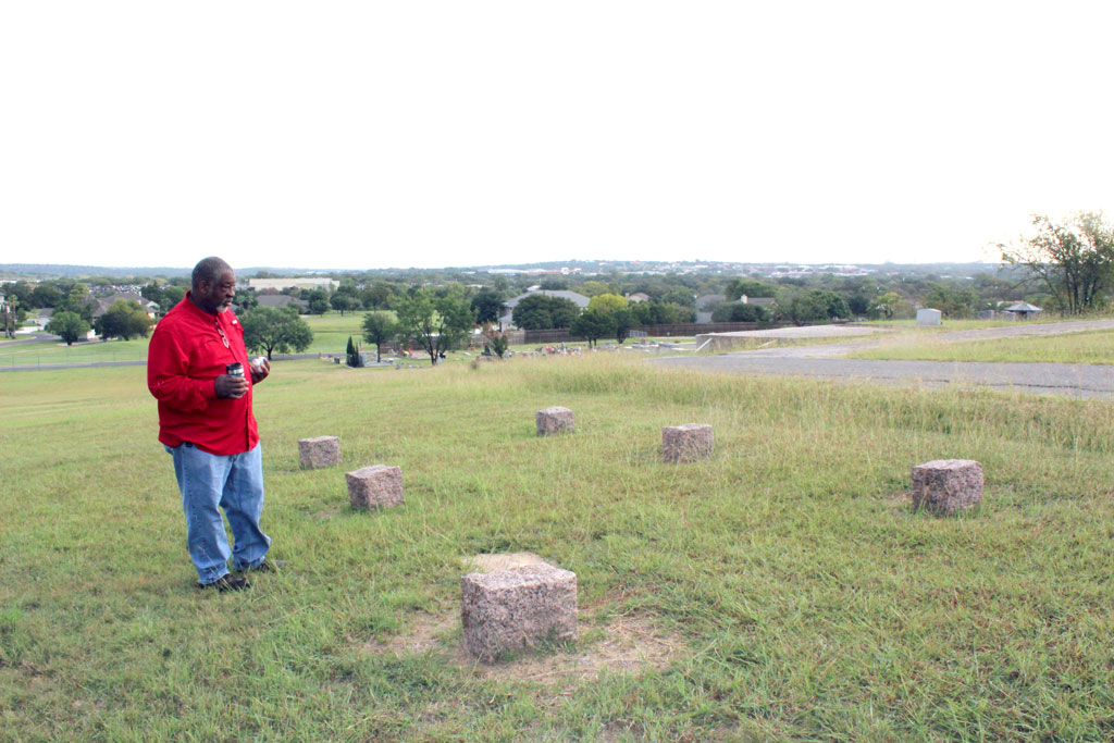 The Rev. George Perry of St. Frederick's Baptist Church of Marble Falls is on a mission to learn the identifies of those buried in unmarked graves in the city's cemetery, many of whom were enslaved people and prisoners. Staff photo