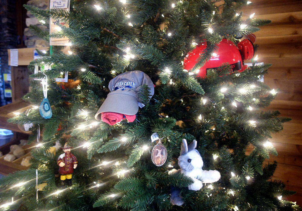 The Christmas tree in the Longhorn Cavern State Park store is decked with gift ideas. Discover more below. Staff photo by Suzanne Freeman