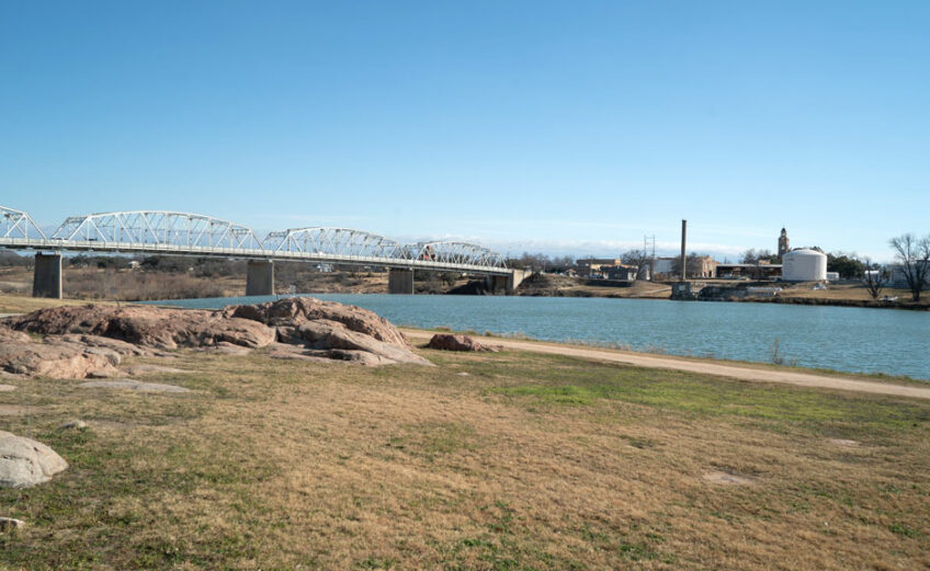 Roy B. Inks Bridge spans the Llano River in the background of this photo of Badu Park. The beloved city park is within walking distance of historic downtown Llano and is one of the best swimming holes around. Staff photo by Dakota Morrissiey