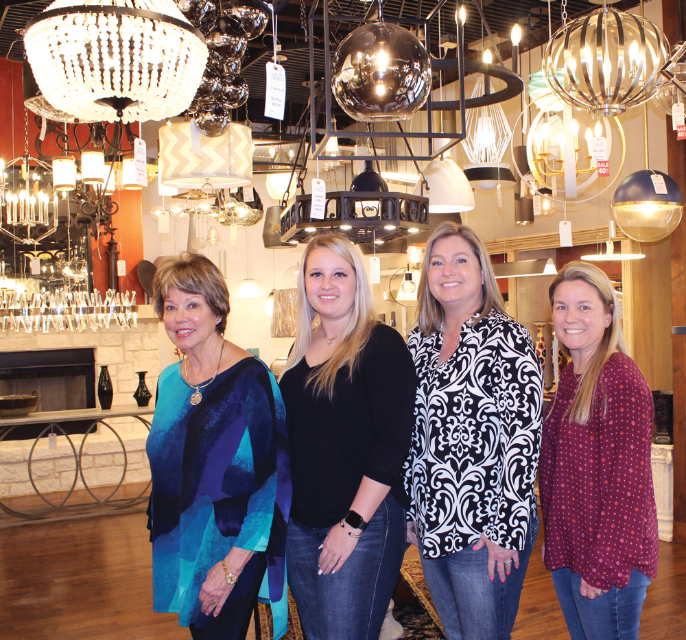 Lighting designers Gay Idom (left) and Courtney Pilley and co-owners Leslie Pilley and and Tanya Nolen at Broadway Showroom in Marble Falls. Staff photo by Jennifer Fierro