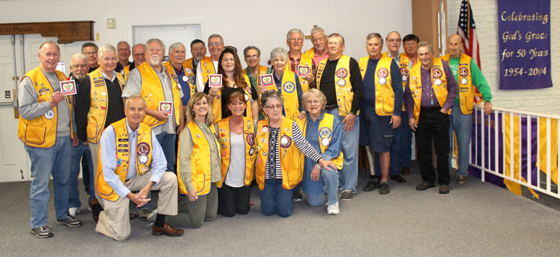 Kingsland Lions Club members were so touched to be named as the Locals Love Us favorite club/organization in the Kingsland area that they all wanted to be in the photo. Staff photo by Jennifer Fierro