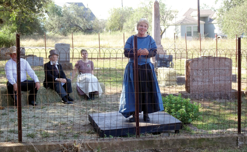 Francie Dix of Horseshoe Bay played Anna Fox, the wife of Conrad Fox, at the Fuchs Cemetery in Cottonwood Shores during Legends of the Falls, a theatrical hayride. Staff photo by Suzanne Freeman