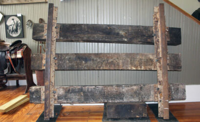 Weighing 450 pounds, this section of railroad now on display at The Falls on the Colorado Museum in Marble Falls was part of the Austin and Northwestern Railroad line that carried granite from Granite Mountain to the Texas State Capitol construction site in Austin in the late 1800s and early 1900s. Staff photo by Jennifer Fierro