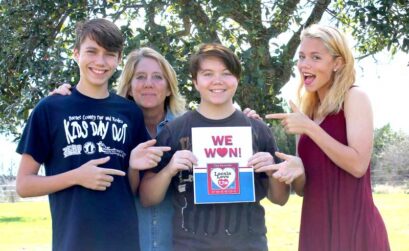 Martelle Luedecke (background) gives credit to her teenage children, J.P. (left), Samm, and Briezie, for her drive toward volunteerism, which led to her being voted Best Volunteer in the Burnet Area in The Picayune’s Locals Love Us awards. Courtesy photo