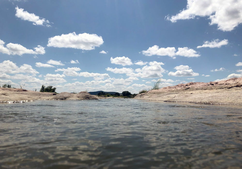 The Llano River forms the swimming holes and sandy beaches of the Kingsland Slab on FM 3404 in Kingsland. The river flows east for a little over 100 miles through Kimble, Mason, and Llano counties before joining the Colorado River and Lake LBJ in the Highland Lakes. Staff photo by Jennifer Greenwell