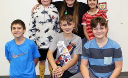 Burnet Middle School teacher Riki Campbell (back row, middle) with students Mason Roberts (back row, left), Alexia Palacios, Zane Hubbard (front row, left), Kyle Conklin, and Evan Joiner. Staff photo by Jennifer Fierro