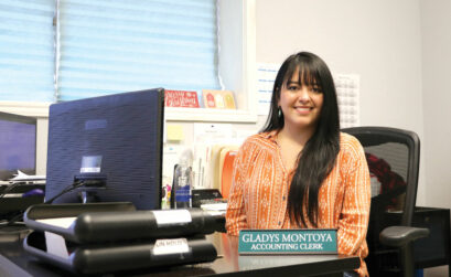 Cottonwood Shores Accounting Clerk and Assistant Financial Officer Gladys Montoya at her desk. Staff photo by Nathan Bush
