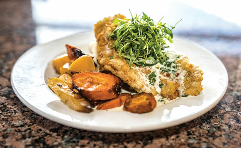 Chicken-fried boar steak with jalapeño gravy from the menu at The Overlook Restaurant at Canyon of the Eagles Resort in Burnet. Photo by Ronnie Madrid/Divine Radiance Photography