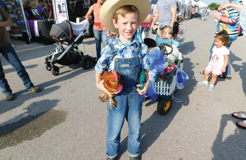 All pets are welcome in the Burnet Bluebonnet Festival's pet parade. The annual event was voted a Locals Love Us favorite. Staff photo by Jennifer Greenwell