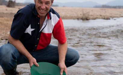 Cameron West pans for gold at the Kingsland Slab where RR 3404 crosses the Llano River. Panning is legal at the slab as well as Long’s Fish and Dig a few miles farther up the river. Photo by Ronnie Madrid