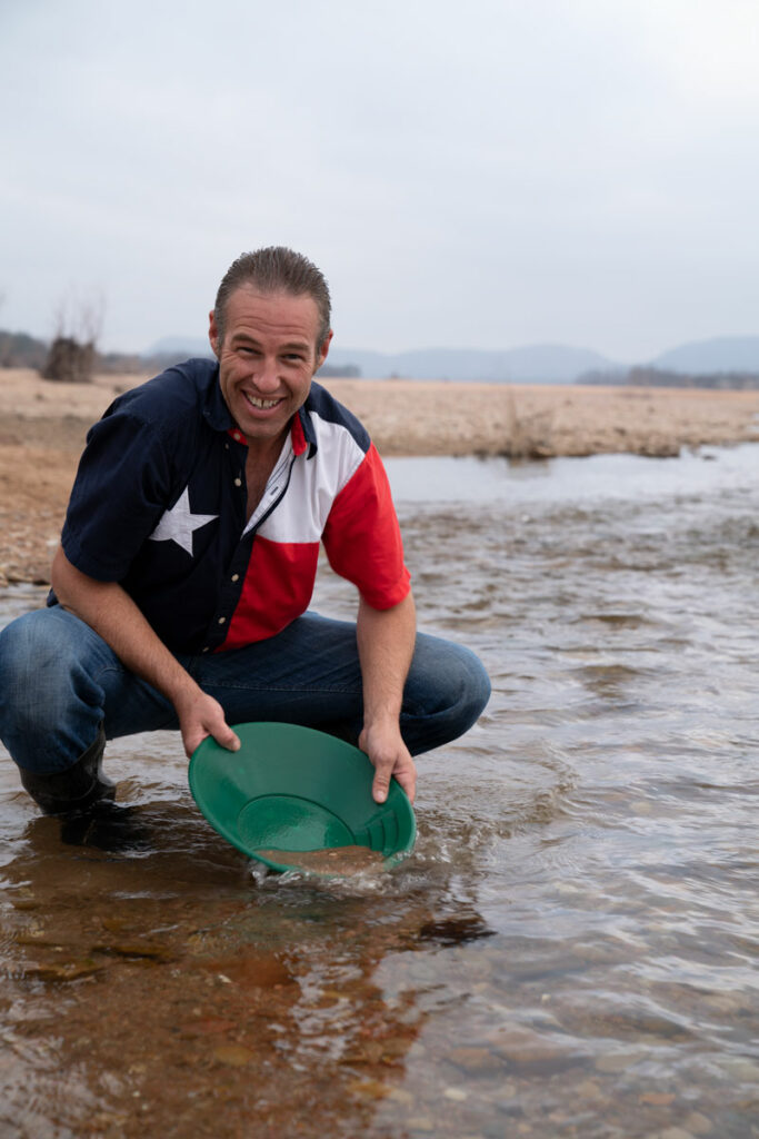 Cameron West pans for gold at the Kingsland Slab where RR 3404 crosses the Llano River. Panning is legal at the slab as well as Long’s Fish and Dig a few miles farther up the river. Photo by Ronnie Madrid