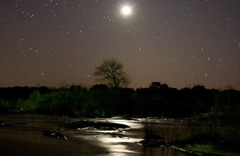 The stars, moon, and Venus shine bright over the Kingsland Slab on the Llano River. To get there, take RR 1431 west through Kingsland then turn west on FM 3404 and stay there for a couple of miles. Staff photo by Jared Fields