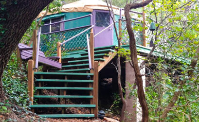 Book a few nights in Rainbow Hearth’s popular and luxurious treehouse yurt overlooking the property. Photo courtesy of Rainbow Hearth Sanctuary and Retreat.