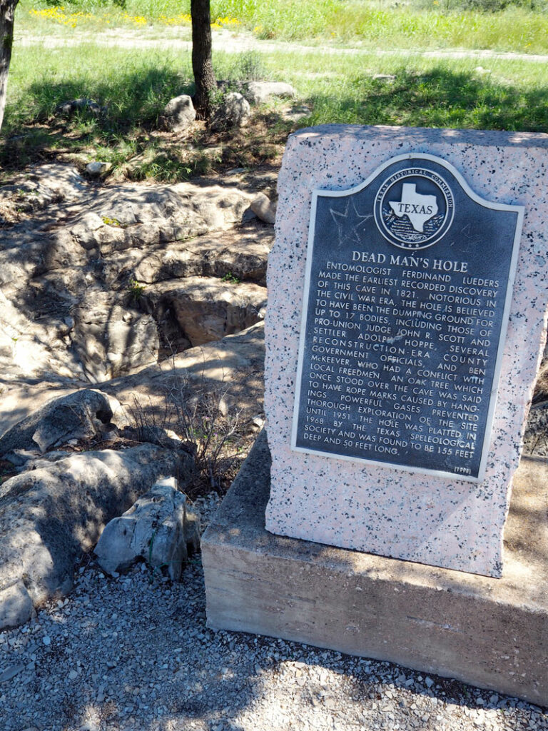 A historical marker gives a brief history of Dead Man's Hole, located on Burnet County Road 401 southwest of Marble Falls. The synopsis, however, can't recreate the fear and horror people in Burnet County — particularly Union sympathizers — felt about the hole during the Civil War and Reconstruction years. Some estimates claim as many as 36 people ended up in Dead Man's Hole, though historians can only connect about five names to it. Still, for several decades the thought of ending up at the bottom of Dead Man's Hole sent shivers down many a person's neck. Staff photo by Daniel Clifton