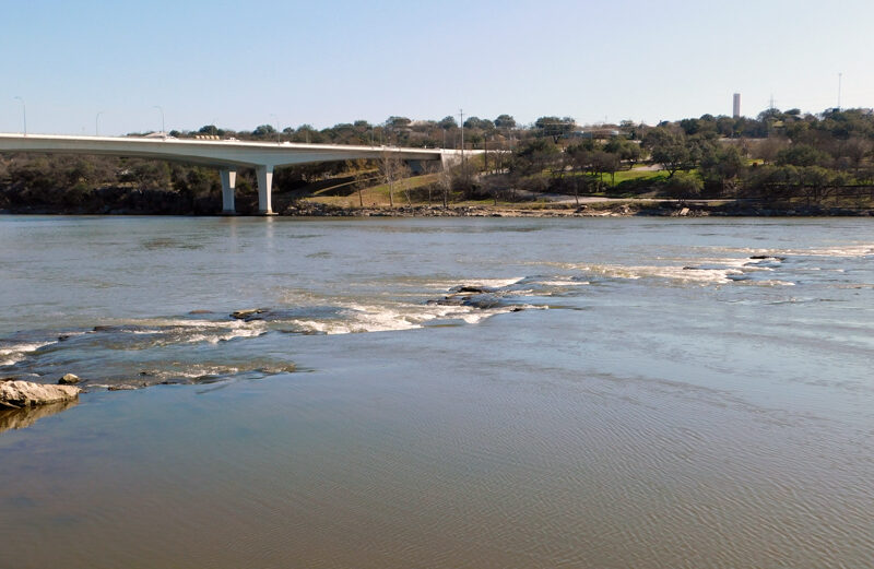 During the most recent drawdown of Lake Marble Falls by the Lower Colorado River Authority, the falls of Marble Falls are just visible. Staff photo by Jennifer Greenwell