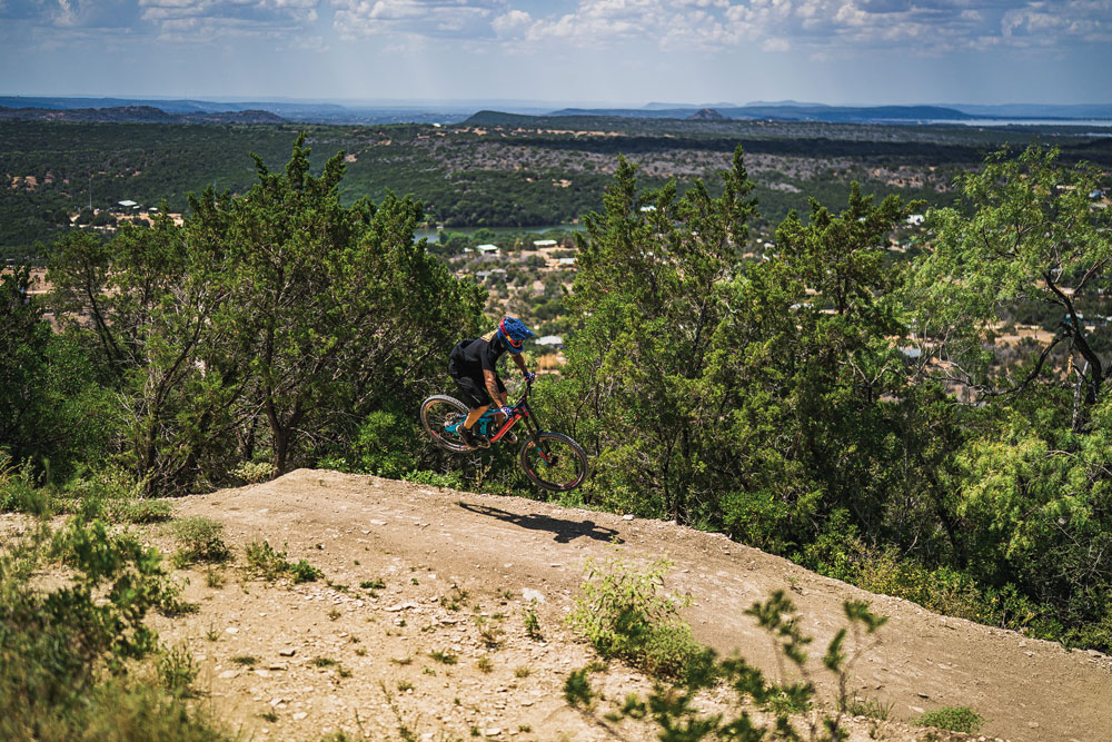 Michael Baker rides the trails at Spider Mountain Bike Park on Lake Buchanan in Burnet County. Photo by Ronnie Madrid