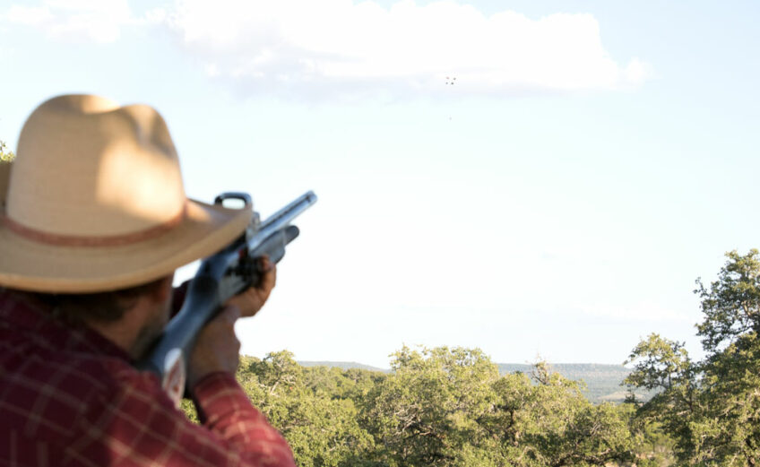 A shooter hits a clay pigeon at Copperhead Creek Shooting Club in Marble Falls. The facility is one of a few places to practice your shot in the Highland Lakes. Staff photo