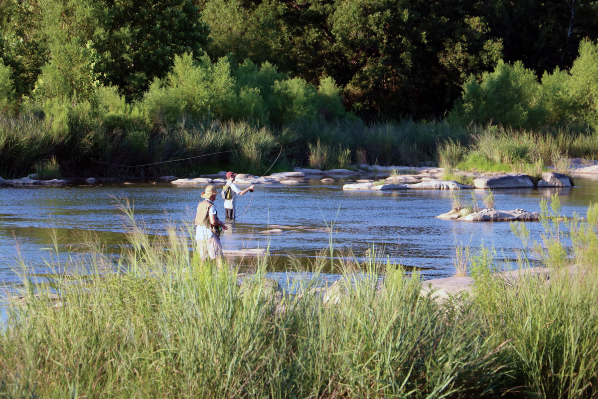 Fly fishing on the Llano River in Castell