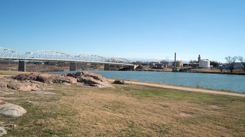 Roy B. Inks Bridge spans the Llano River in the background of this photo of Badu Park. The beloved city park is within walking distance of historic downtown Llano and is one of the best swimming holes around. Staff photo by Dakota Morrissiey