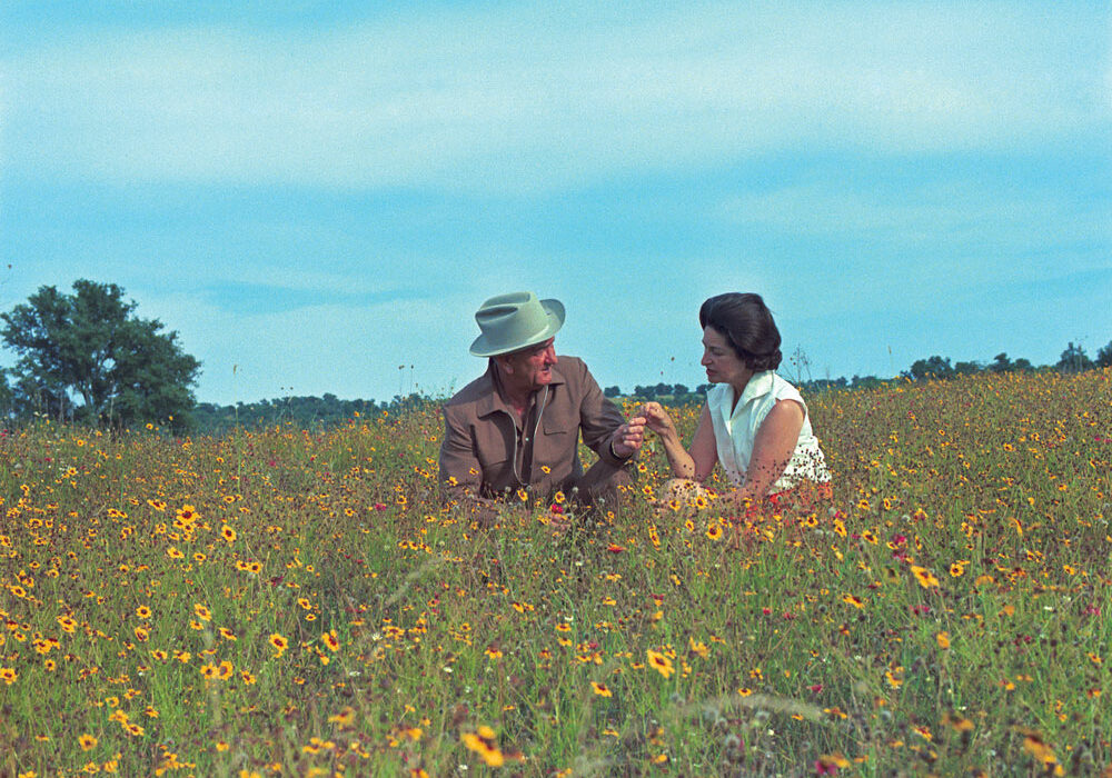 President Johnson and first lady Lady Bird Johnson in a field of wildflowers near Johnson City. Photo courtesy of LBJ National Historic Site