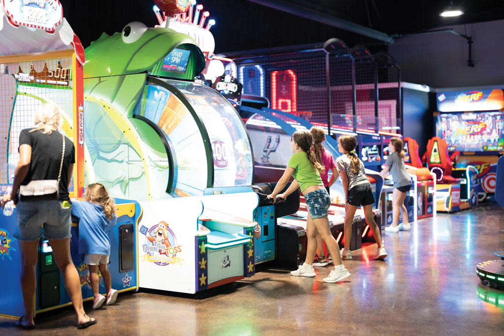 The arcade at Putters & Gutters in Marble Falls is packed with exciting games. Photo by Ronnie Madrid/Divine Radiance Photography