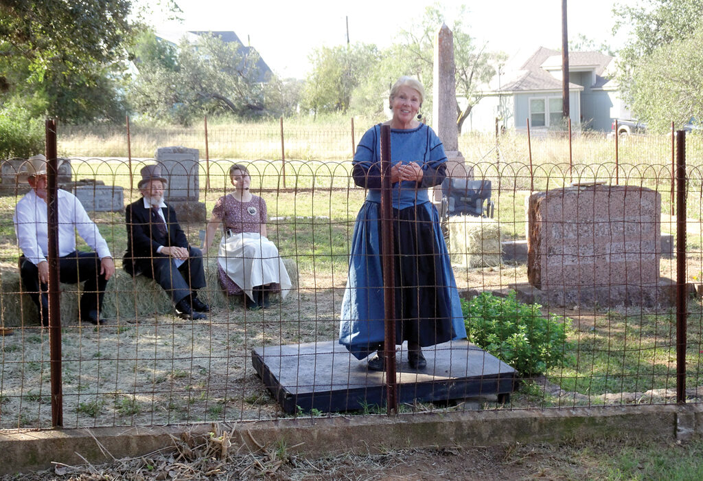 Francie Dix of Horseshoe Bay played Anna Fox, the wife of Conrad Fox, at the Fuchs Cemetery in Cottonwood Shores during Legends of the Falls, a theatrical hayride. Staff photo by Suzanne Freeman