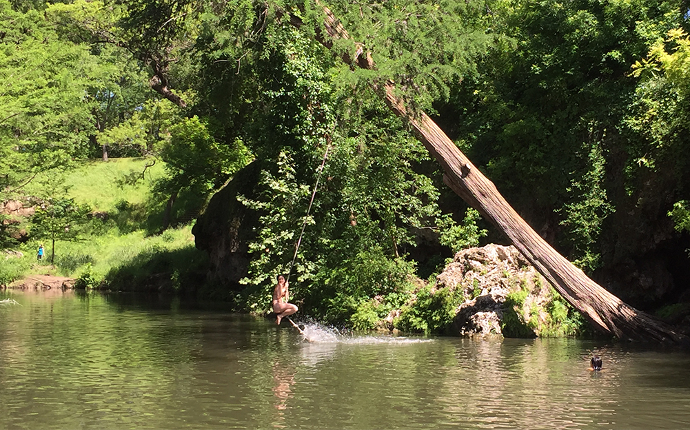 People have enjoyed cooling off in the spring-fed waters of Krause Springs in Spicewood since 1955. Photo by JoAnna Kopp