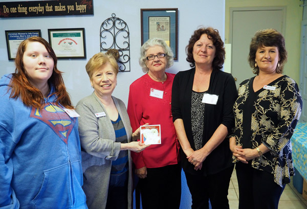 Students and staff of the Christian Women’s Job Corps of the Highland Lakes celebrate winning the 2015 Locals Love Us favorite Burnet-area organization. The program provides job and career training for women. But students will tell you it goes beyond skill training as the staff provides great support and encouragement. Pictured are Anna Close (left), site director Alice Wooten, Billie Hanson, Terri Jabot and staff member (and program graduate) Diane Shaffer. Staff photo by Daniel Clifton