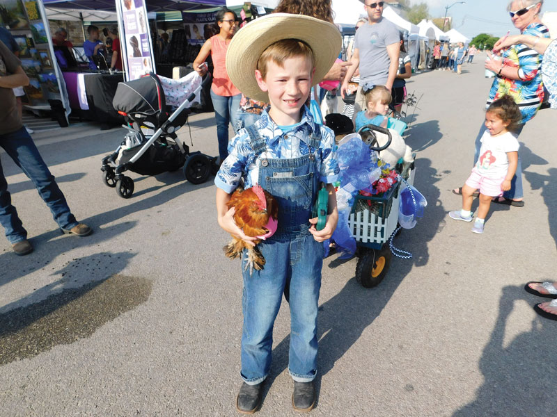 All pets are welcome in the Burnet Bluebonnet Festival's pet parade. The annual event was voted a Locals Love Us favorite. Staff photo by Jennifer Greenwell