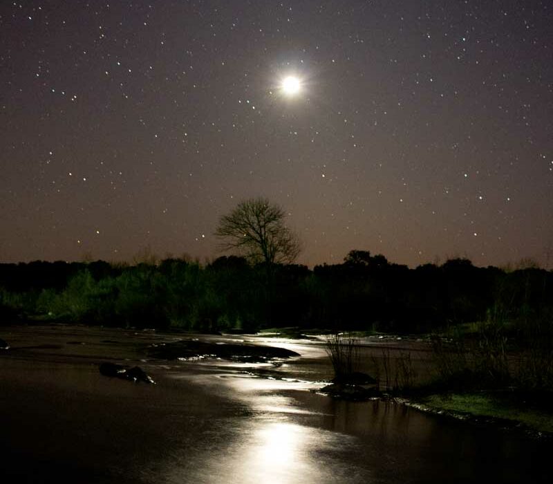 The stars, moon, and Venus shine bright over the Kingsland Slab on the Llano River. To get there, take RR 1431 west through Kingsland then turn west on FM 3404 and stay there for a couple of miles. Staff photo by Jared Fields