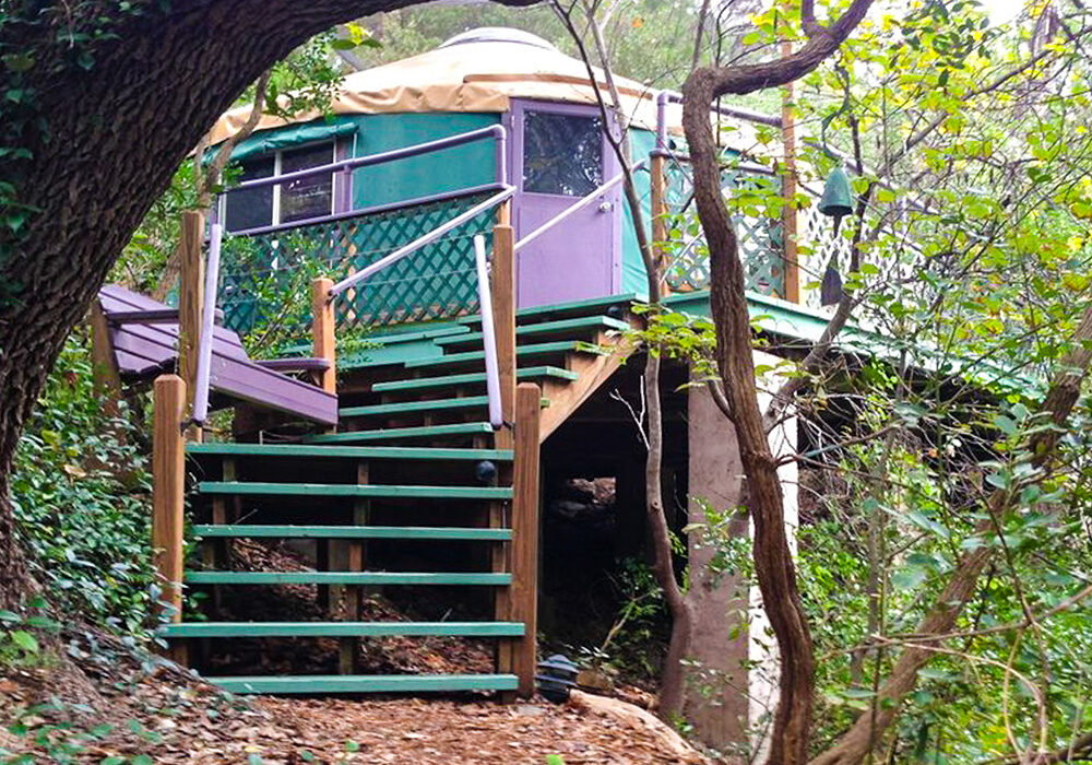 Book a few nights in Rainbow Hearth’s popular and luxurious treehouse yurt overlooking the property. Photo courtesy of Rainbow Hearth Sanctuary and Retreat.