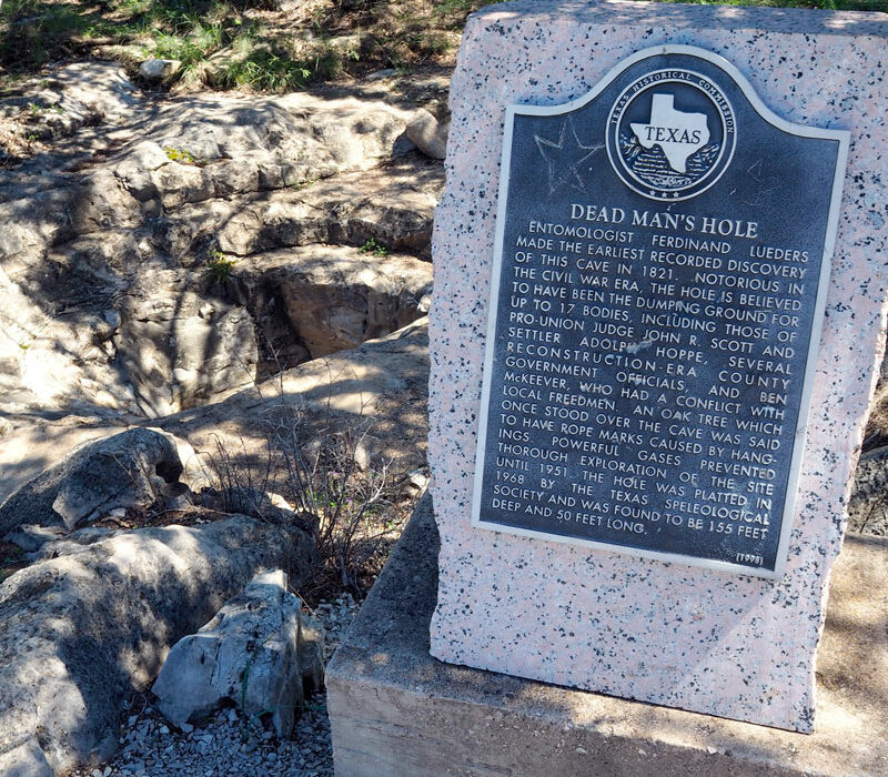 A historical marker gives a brief history of Dead Man's Hole, located on Burnet County Road 401 southwest of Marble Falls. The synopsis, however, can't recreate the fear and horror people in Burnet County — particularly Union sympathizers — felt about the hole during the Civil War and Reconstruction years. Some estimates claim as many as 36 people ended up in Dead Man's Hole, though historians can only connect about five names to it. Still, for several decades the thought of ending up at the bottom of Dead Man's Hole sent shivers down many a person's neck. Staff photo by Daniel Clifton