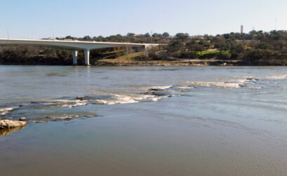 During the most recent drawdown of Lake Marble Falls by the Lower Colorado River Authority, the falls of Marble Falls are just visible. Staff photo by Jennifer Greenwell