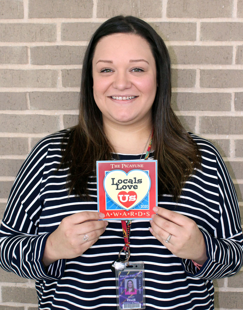 The Picayune Magazine readers and KBEY 103.9 FM Radio Picayune listeners voted Marble Falls Middle School's Ashley Ellis their favorite Locals Love Us receptionist. Staff photo by Jennifer Fierro