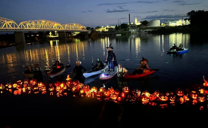 Jack-o-lanterns floating in the Llano River