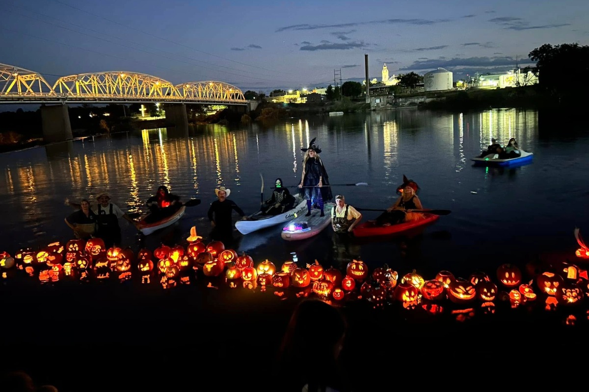 Jack-o-lanterns floating in the Llano River